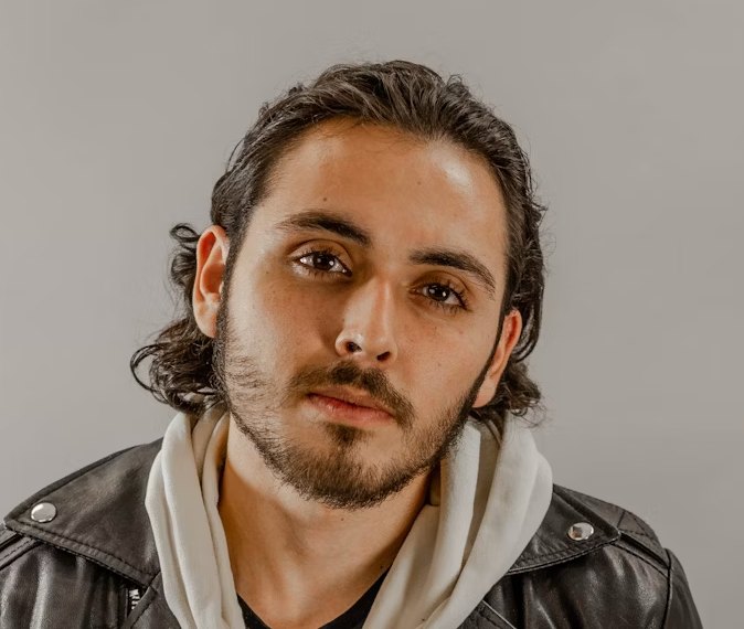 Young man looking at camera.