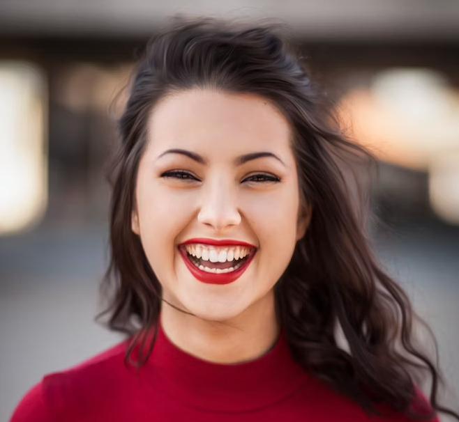 Smiling dark haired woman portrait.